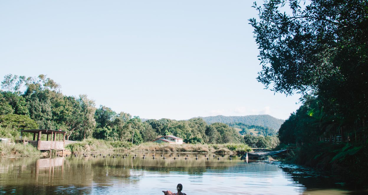 girl floating in dam at stokers siding