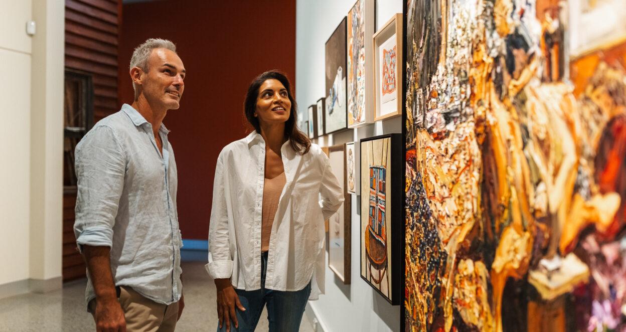 Couple view artwork in the Margaret Olley Art Centre at Tweed Regional Gallery