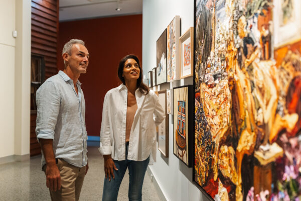 Couple view artwork in the Margaret Olley Art Centre at Tweed Regional Gallery