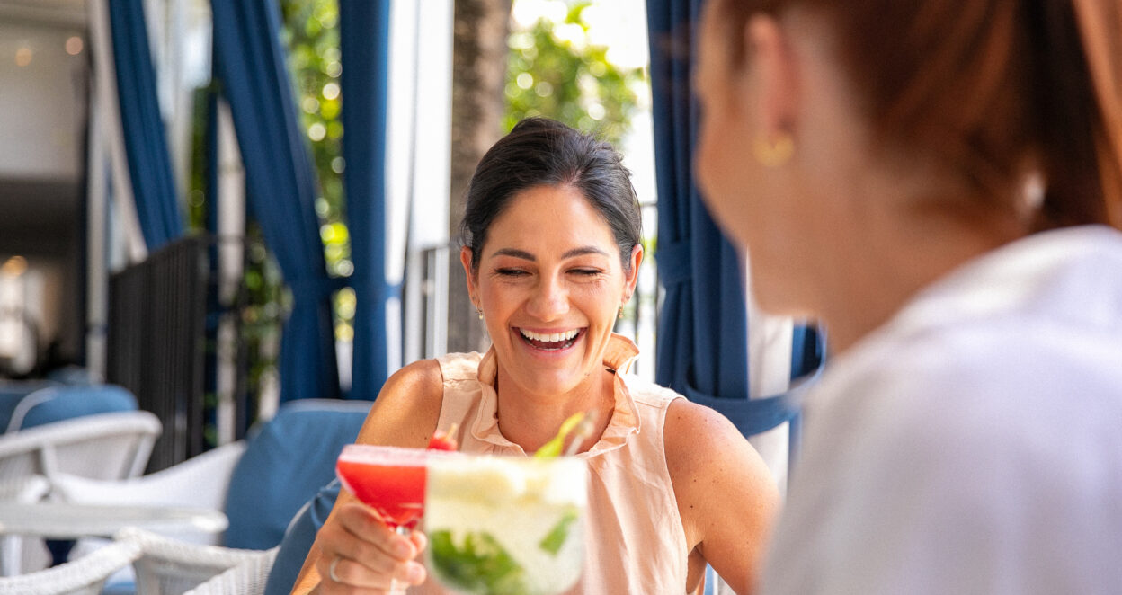 couple having cocktail at Paper Daisy Restaurant