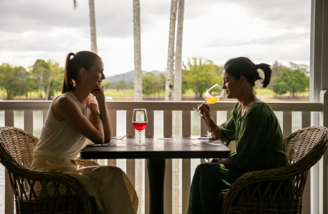 couple having wine at chef hatted restaurant
