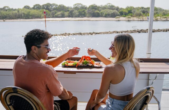 couple on tweed eco cruise