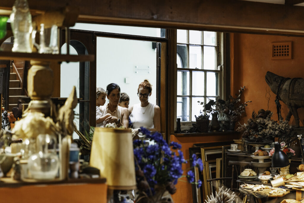 family viewing the Margaret Olley Art Centre home recreation