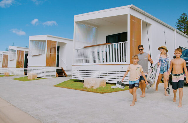 family heading to beach from tweed holiday parks kingscliff north cabin