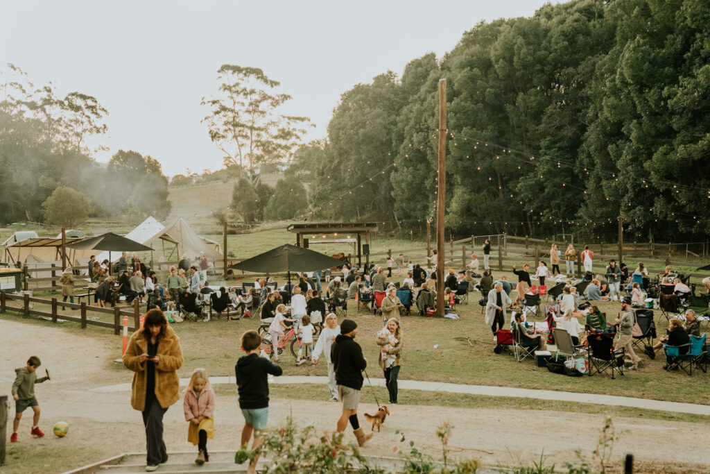 families gather outdoors at Hosanna Farmstay