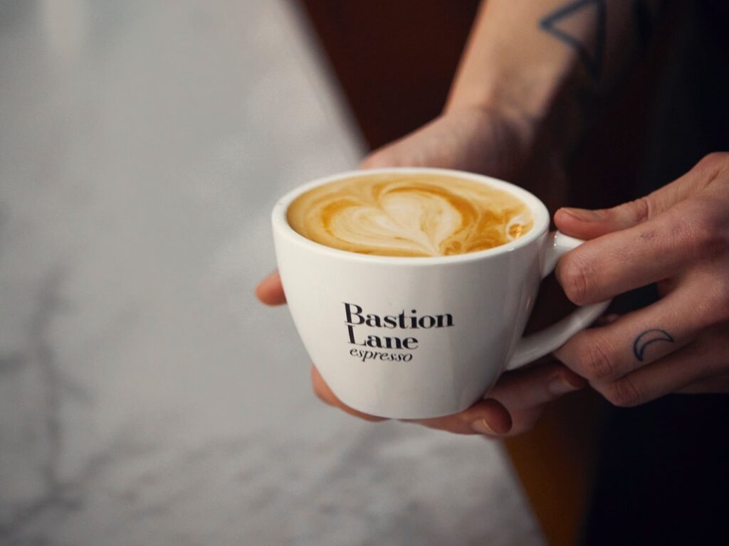 barista made coffee in bastion lane espresso coffee cup