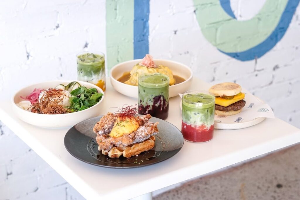 table of vibrant breakfast dishes at cafe