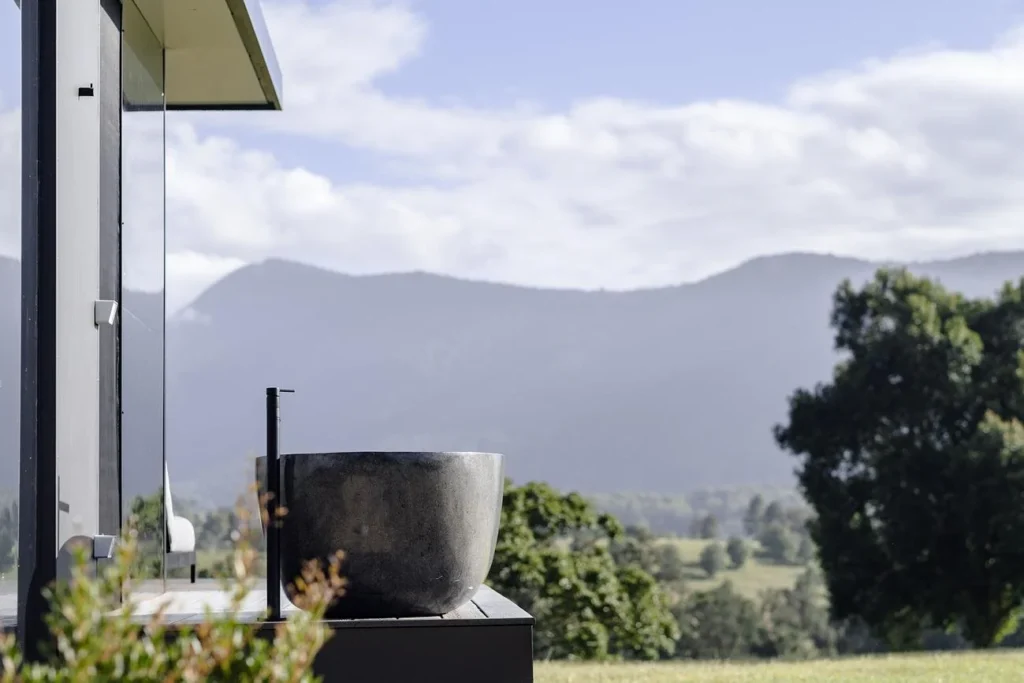 Outdoor bath surrounded by mountains