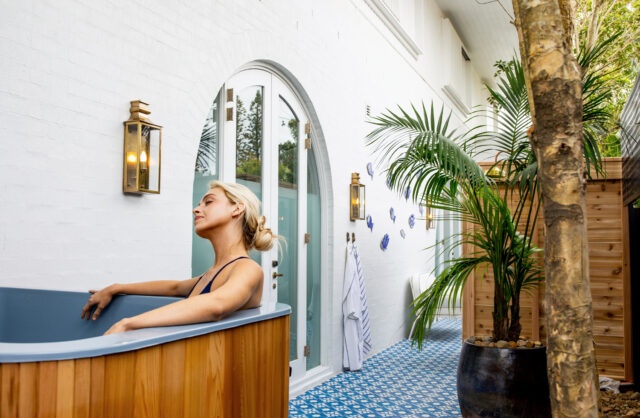 girl in hot tub at Halcyon Wellness banner image