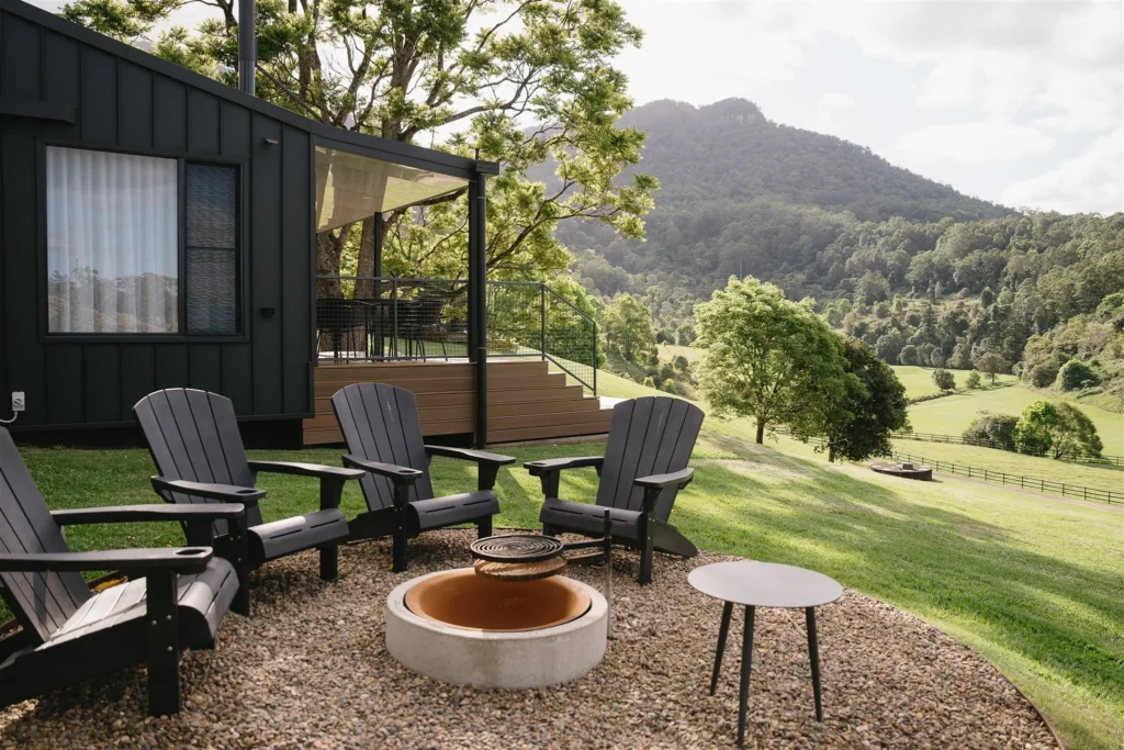 chairs around firepit at eco stay in The Tweed hinterland