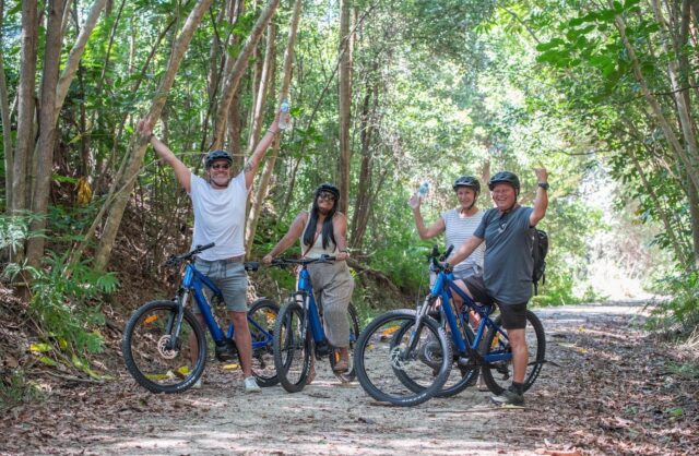 group ride bikes on the northern rivers rail trail for outdoor team building activity