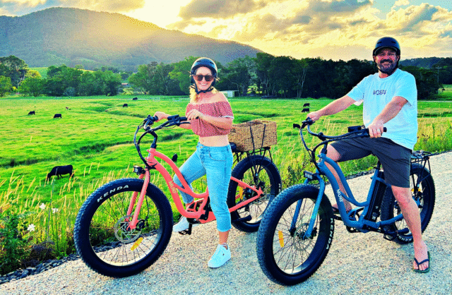 team ride ebikes in countryside