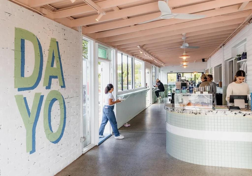 filipino-inspired tweed heads cafe with sunlit modern interiors and hand painted murals