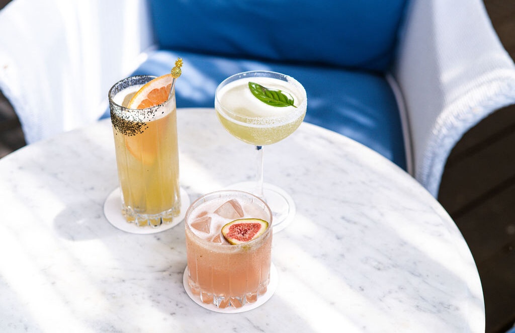 three cocktails on table at paper daisy in northern nsw
