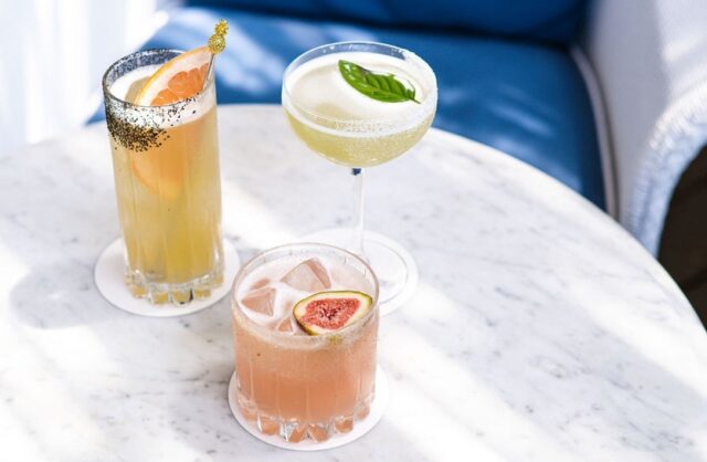 three cocktails on table at paper daisy in northern nsw